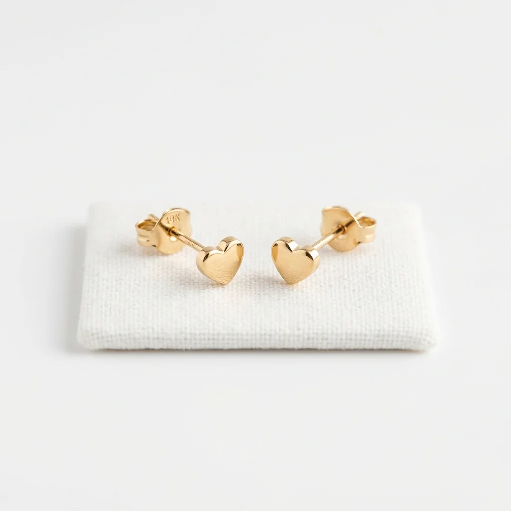 Aretes corazón de oro 18K